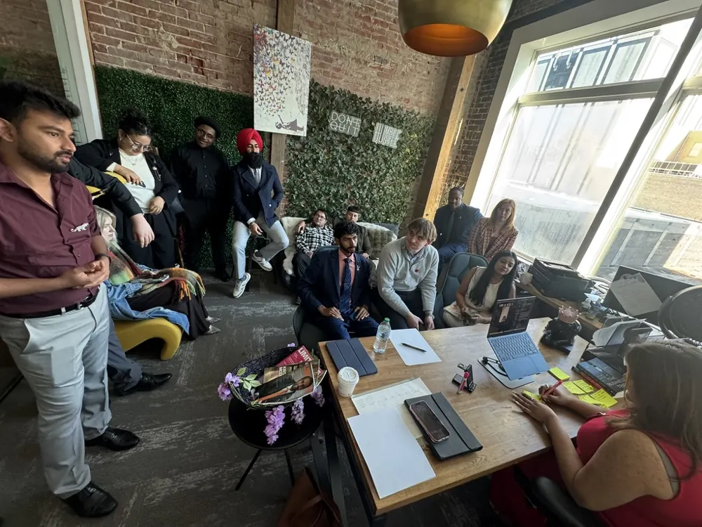The Crescent office: a team working by the window wall