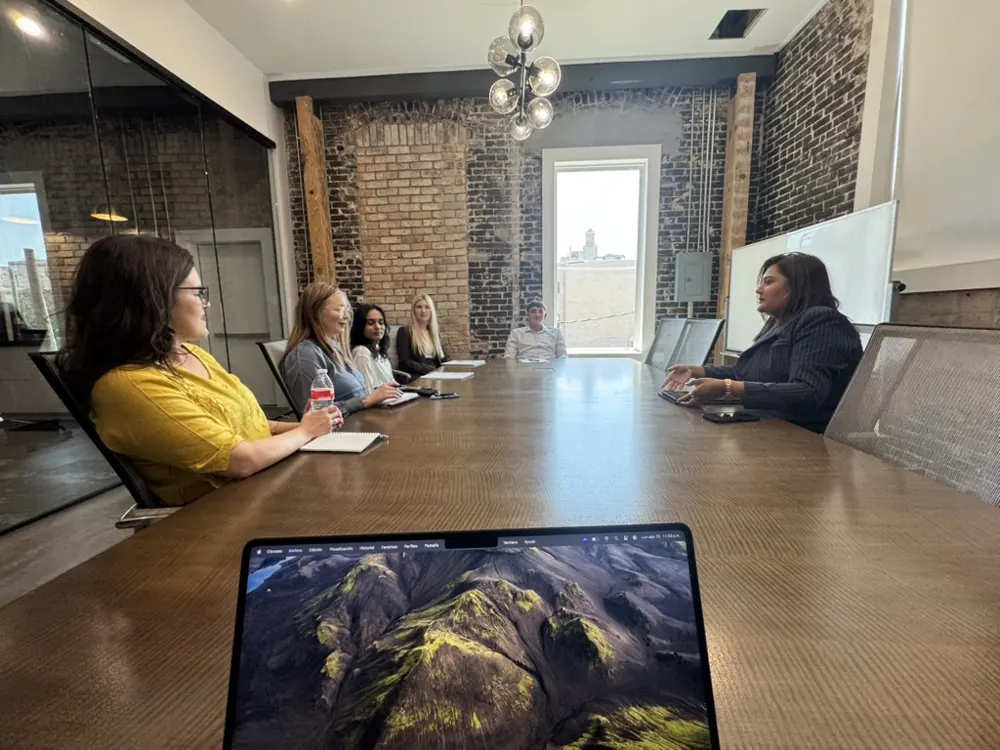 The Crescent boardroom under pendant lights