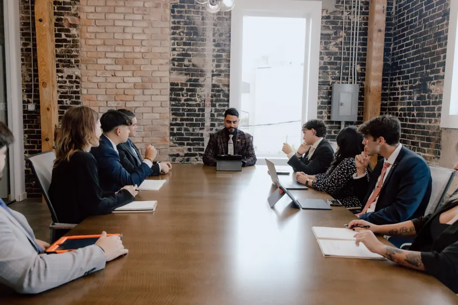 A Crescent team planning a campaign around the boardroom table